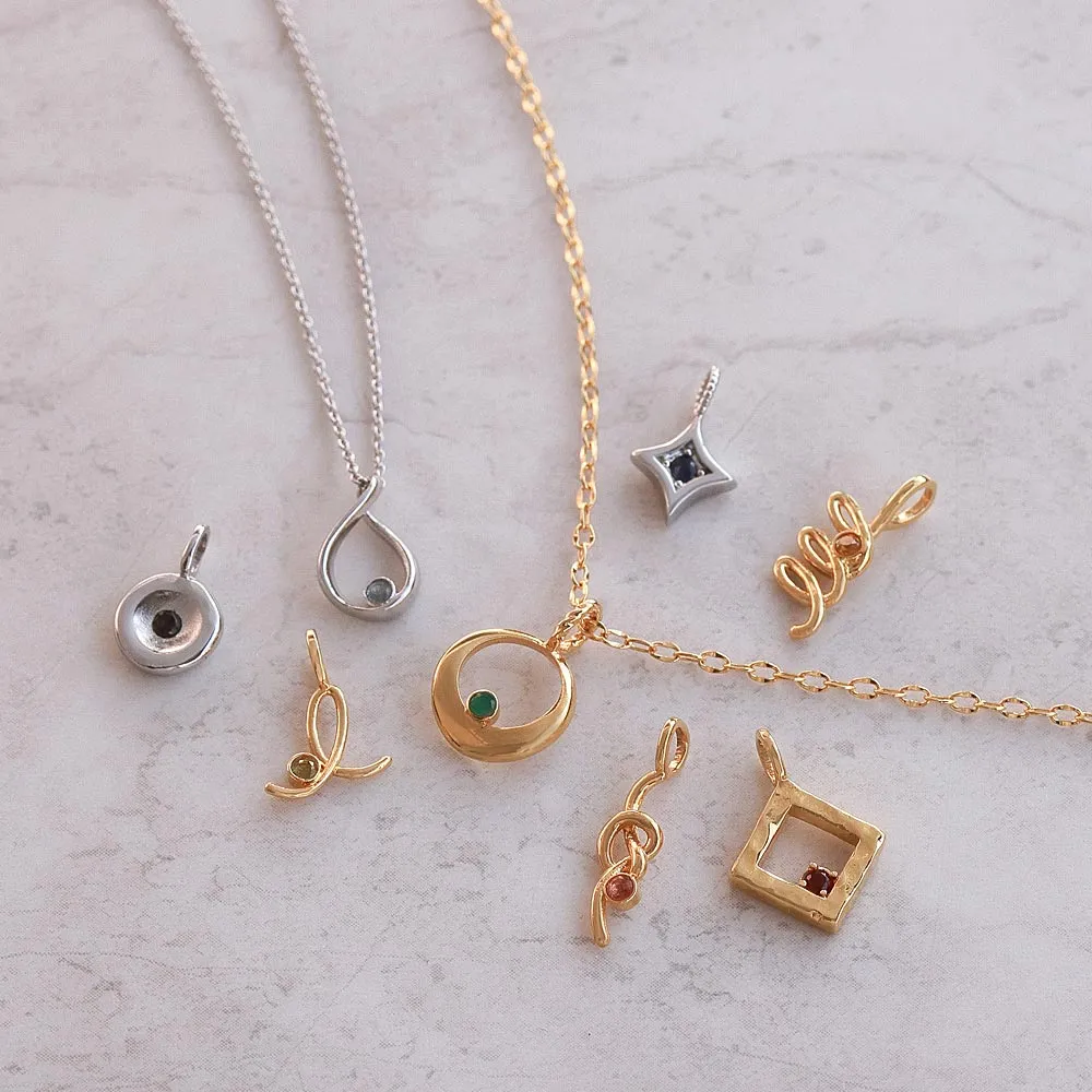 Gold Tone Spiral Necklace Charm